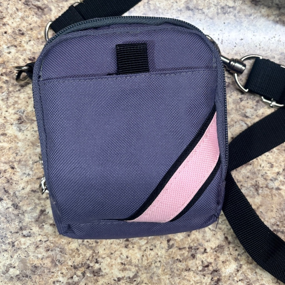 Small purple crossbody travel bag
